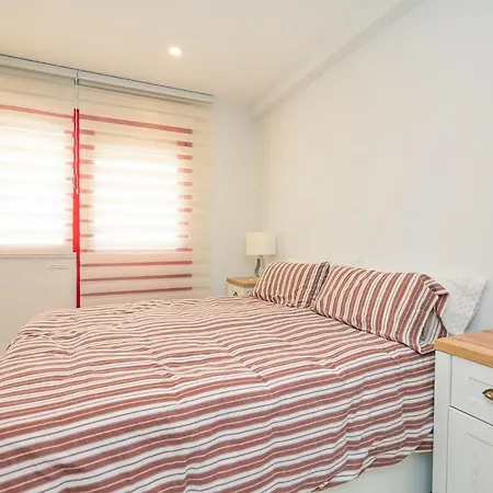 Urbanizacion Con Piscina Arnelas 桑亨霍